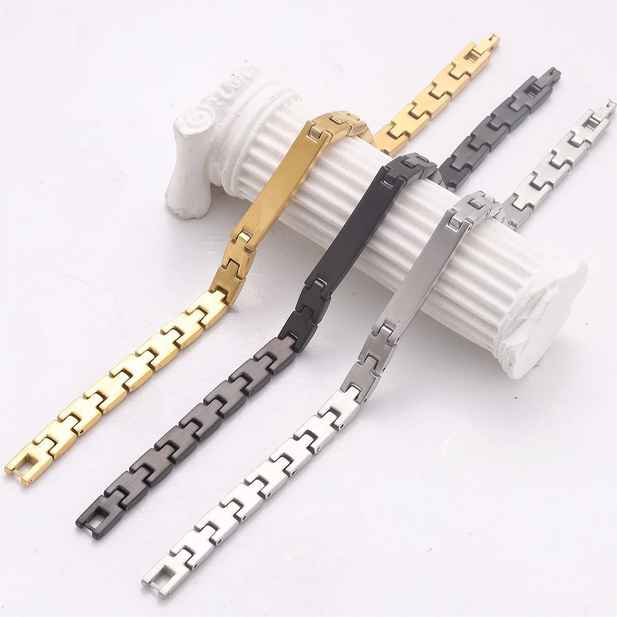 Modern masculine stainless steel wrist jewelry, featuring a detailed crocodile logo on a durable link chain with a secure fold-over clasp, perfect for business casual or streetwear looks.jpg